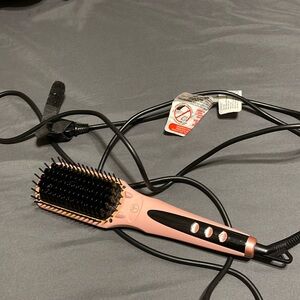 Used Lange straightening brush.